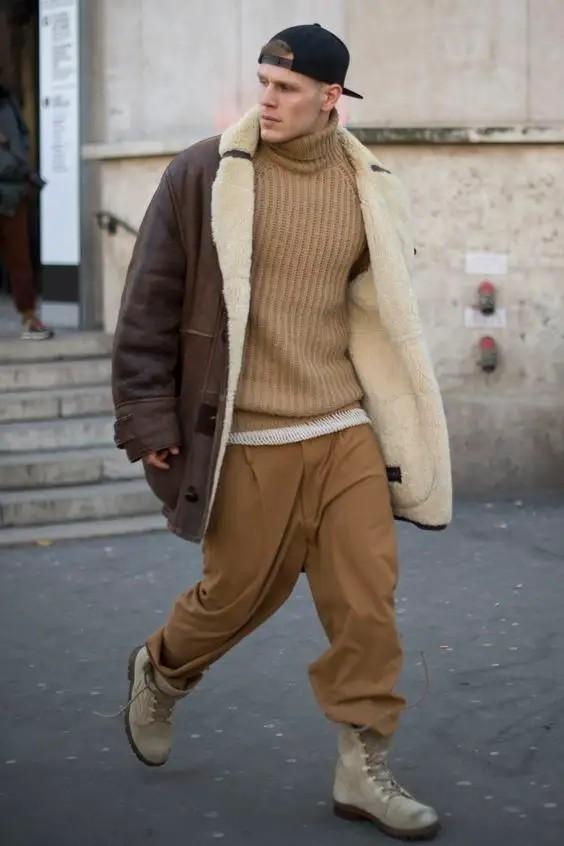 穿黑色毛衣的男人，男生牛仔裤配什么上衣好看（冬季高领毛衣才应该是男士的必备）