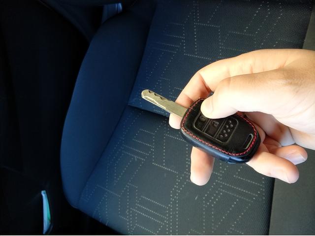 如何设置无钥匙进入功能，而国内却把它当成宝