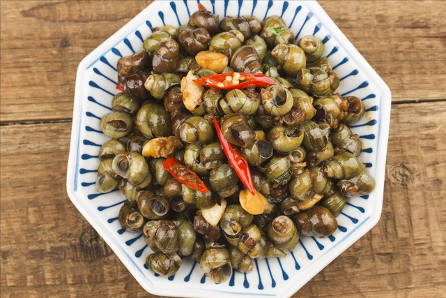 田螺肉怎么炒好吃，田螺煲怎么做好吃（偷偷多加1味料）
