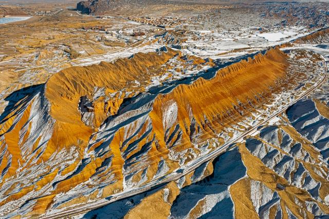 张掖在哪个省，张掖 哪个省（甘肃张掖：雪落七彩丹霞分外艳）